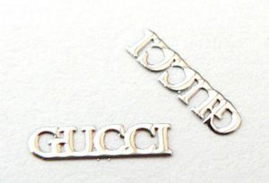 Kovové príklepky do nechtov Gucci strieborné | 100ks balenie, 20ks balenie