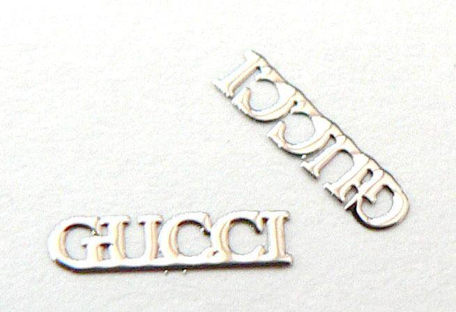 Kovové príklepky do nechtov Gucci strieborné